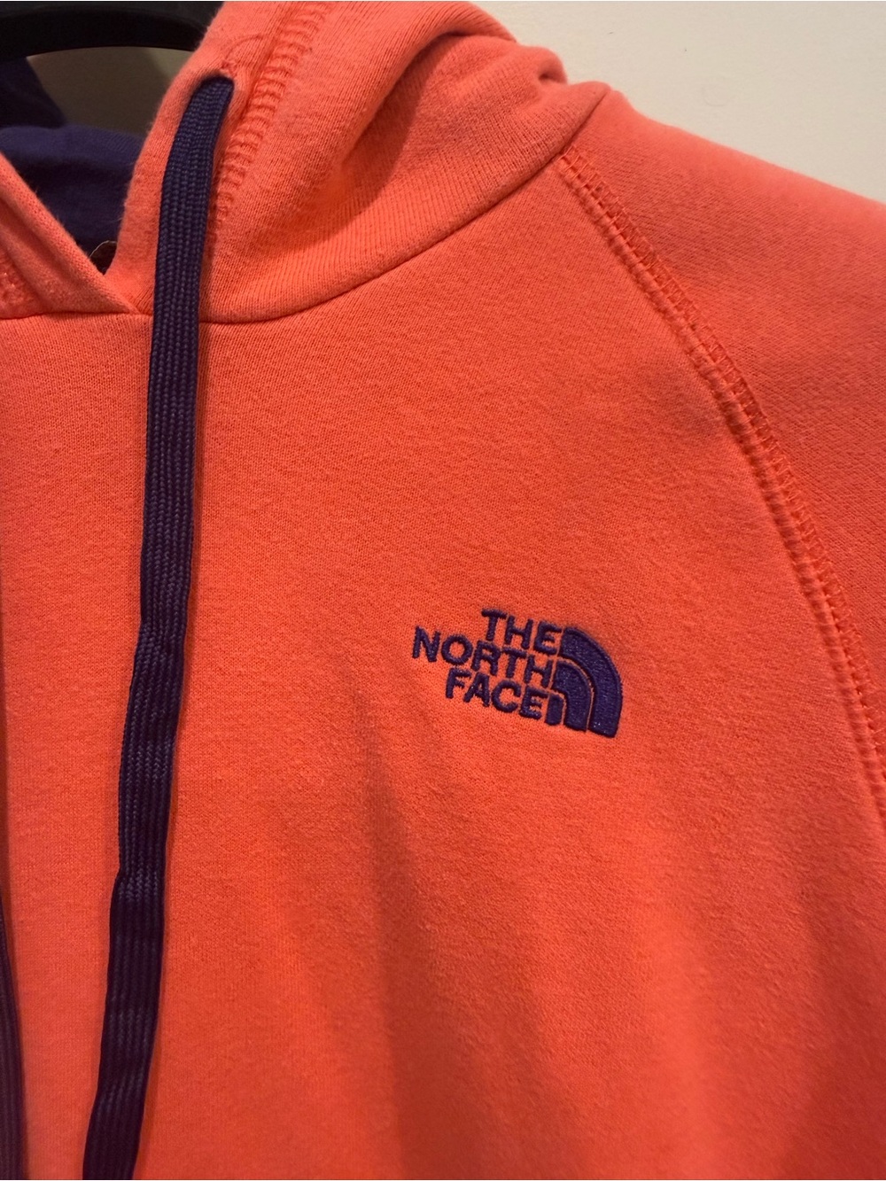 The North Face coral pink Hoodie with Purple Logo
